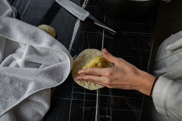 Hand Shaping Fried Pies with Savory Potato and Fried Onion Filling