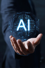Artificial Intelligence in Human Hand. Person holding or presenting a glowing, futuristic digital interface with the letters "AI" (Artificial Intelligence).