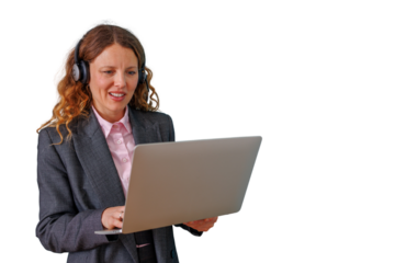 Professional businesswoman wearing headset and using laptop for video call or remote work, communicating with clients on transparent background