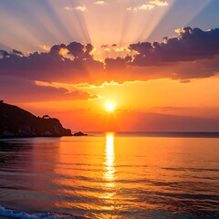 Radiant sun sets over calm waters, painting the sky with warm hues and reflecting on the sea surface