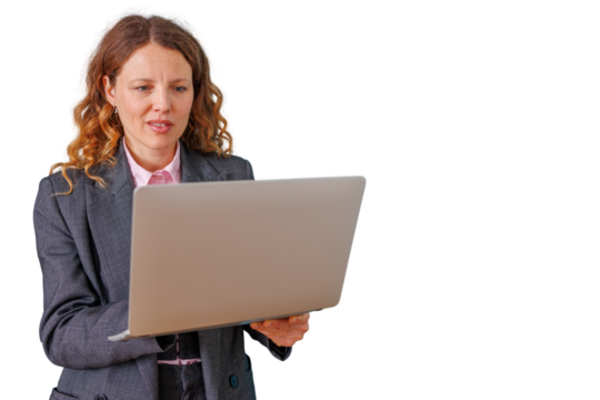 Professional businesswoman in suit holding and focusing on laptop, working communicating online on transparent background - Powered by Adobe
