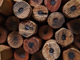 Stack of wooden pencil with visible texture.