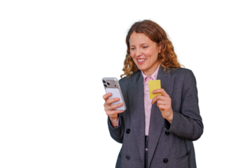 Smiling woman shopping online using smartphone and credit card for secure e-commerce payment