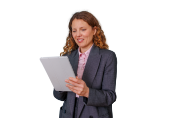 Businesswoman looking at digital tablet, smiling, analyzing data, communicating, using modern smart technology