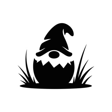 A silhouette of a gnome hatching from an eggshell, surrounded by grass
