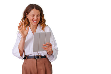 Fototapeta premium Woman smiling and waving during video call on tablet, engaging in virtual communication with transparent background
