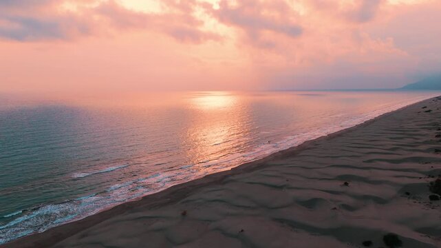 Patara Beach with its golden sand dunes stretch along crystal-clear turquoise water, one of the longest and most unspoiled beaches in Antalya, Turkey.