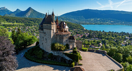 Aerial view of the Château de Menthon-Saint-Bernard overlooking Lake Annecy in Haute Savoie, Auvergne-Rhône-Alpes, France © Alexandre ROSA