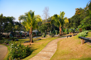 Obraz premium Walkway in the Mae Fah Luang Garden with vibrant floral terraces in Doi Tung near Chiang Rai, Northern Thailand