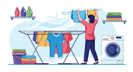 Woman hanging freshly washed clothes on a drying rack in a laundry room with a washing machine and detergents nearby.