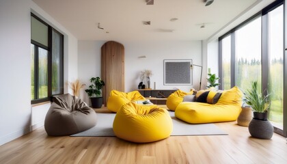 bright and modern living area with yellow accents and spacious design featuring bean bag chairs and wooden flooring