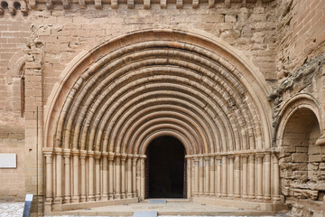 Romanesque monastery of Santa Maria de Sijena. Semicircular arch. Spain