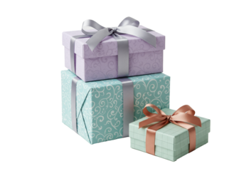 Elegant stack of lavender floral, periwinkle swirl, and sage plaid gift boxes with silver and rose gold ribbons, on a transparent background, concept of luxury holiday gift-giving