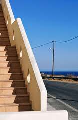 building exterior staircase on the roadside along the coast