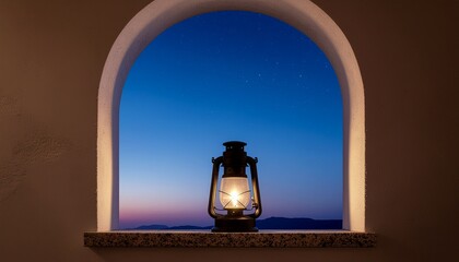 A lantern sits on a stone ledge within an arched window frame, glowing warmly against a serene blue and pink dusk sky.