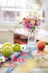 still life with apples and flowers
