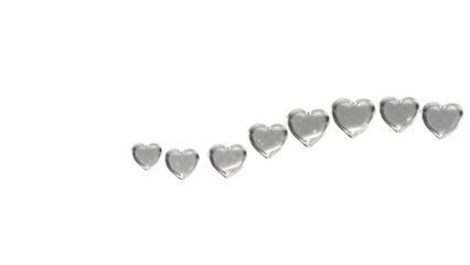 Silver hearts on ribbon isolated on transparent background