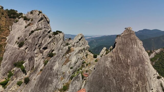 Aerial Drone View of Castelmezzano Village Nestled Among Rocky Peaks in the Dolomiti Lucane, Basilicata, Italy