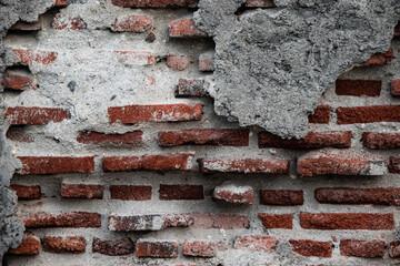 Exposed Red Brick Wall with Rough Cement and Peeling Plaster Texture
