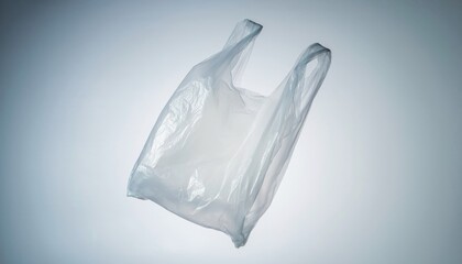A transparent plastic bag is shown against a light blue background, symbolizing waste and recycling efforts