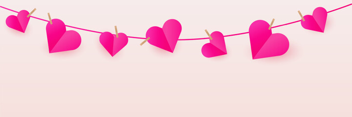 Horizontal empty banner with a garland of paper hearts. Romantic banner or flyer concept for Valentine's Day holiday with empty space for your design. Background for social media, website banner or pr © Tetiana Kubara