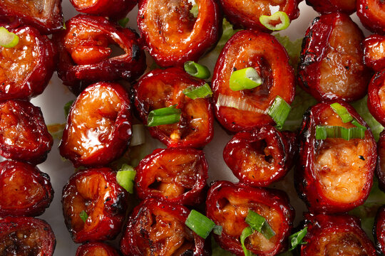 A top down view of pork isaw, as a background.