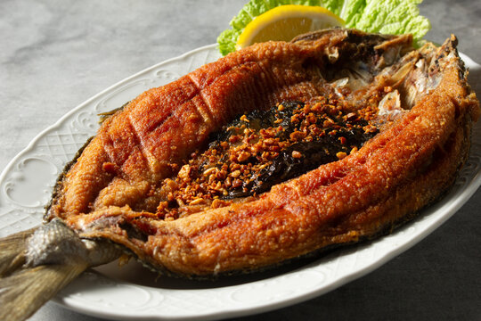 A view of a plate of fried bangus.