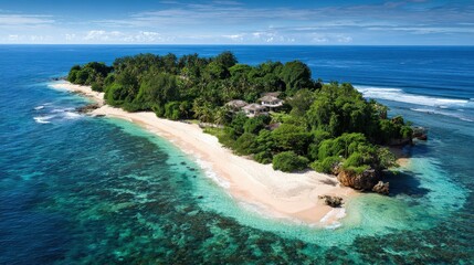 Aerial view captures dense tropical vegetation surrounding a secluded white sand beach bordering vibrant turquoise ocean water
