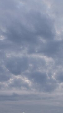 Cloudy sky moving. 4K Vertical