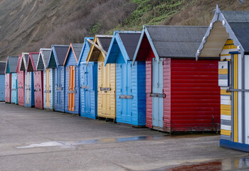 Colourful beach huts on the promenade in Sheringham, Norfolk Coast