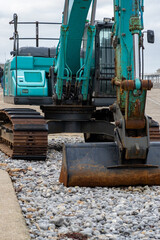Front on view of an old and rusty digger or earth mover