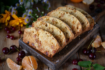 Pieces of sweet raisin cake on a board. Delicious cake for breakfast. Close-up.