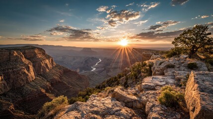 Majestic canyon vista unfolds dramatically beneath the setting sun radiating brilliant rays.