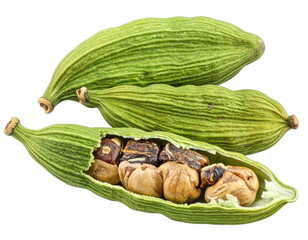 Close-up of green spice pods, one split open, revealing brown seeds. Isolated on black