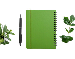 A green notebook with a pen and leaves isolated against a black background