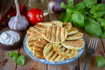 Grilled zucchini fritters. Vegetable fritters for lunch. Close-up.