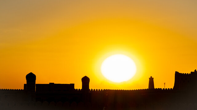 South Gate and wall (Tosh Darvosa) at sunset, Ichan Kala Old City, Khiva, Kizilkum desert, Khwarezm region, Uzbekistan
