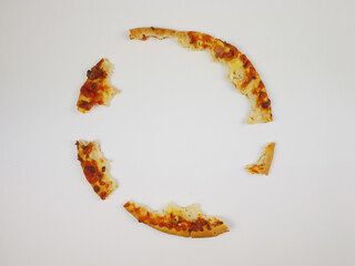 Pizza Crust Leftovers Arranged in Circular Shape on White Background Showing Minimal Food Waste Concept After Eating Pizza Meal
