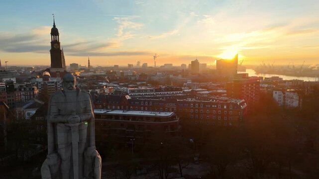Aerial drone footage (reverse flight) of the famous Bismarck Memorial at sunrise in Hamburg