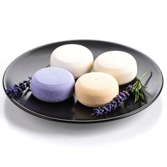 Three vibrant bath bombs in pastel colors rest on a sleek black plate, surrounded by delicate lavender flowers, creating a serene and inviting spa aesthetic.