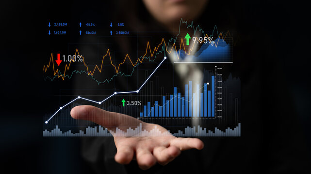 A business professional showcases financial data through a holographic interface featuring growth metrics and analytical charts, symbolizing success and innovation. Scalp - Powered by Adobe