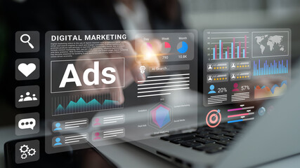 A modern office scene showcasing digital marketing analysis with graphs, charts, and data insights displayed on a laptop screen, highlighting strategic advertising trends. Gantry
