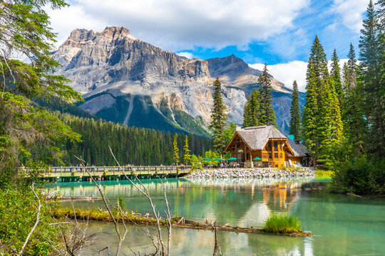 Emerald lake lodge reflecting in turquoise water of emerald lake, banff national park, canada - Powered by Adobe