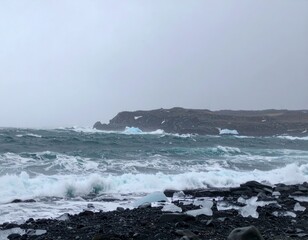 Fototapeta premium Crashing Ocean Surf In Snowfall