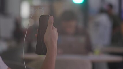 Close-ups of hands holding and using smartphones: typing, scrolling, scanning QR codes. Perfect for tech, finance, app, and communication content. - Powered by Adobe