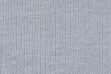 Soft light gray jersey knit fabric pattern close up as background
