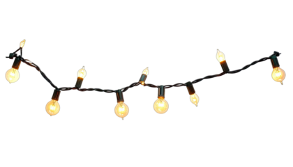 A string of warm white incandescent globe and flame-tip holiday lights against a black background.
