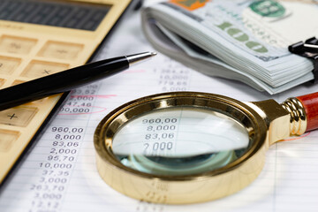 Business and accounting supplies arranged in a composition on an office desk. Top view.