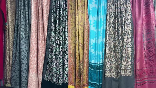 indian women traditional wear collection with rich colors and prints at retail store