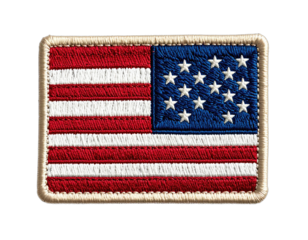 Embroidered flag patch featuring red stripes, white stars on blue, and cream-colored stitching border